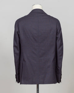 Single breasted
Notch lapel
Two buttons in front
Four sleeve buttons
Welted chest pocket
Patch side pockets
Modello: Sorrento
Hand finished&nbsp;
Half canvas
Half lined
Composition: 74% wool, 17% silk, 9% linen
Article: G201026
Col. Brown and blue
Made in Napoli, Italy Luigi Borrelli Checkered Jacket / Brown &amp; Blue