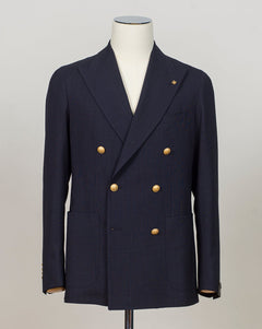 Double breasted 6 buttons
Peak lapels
Welted chest pocket
Patch side pockets
Unconstructed shoulder
Unlined
4 sleeve buttons
Model: 1SHO20K
Art. 150185U
Col B3199
100% wool
Made in Italy Tagliatore Double Breasted &nbsp;Club Blazer / Navy