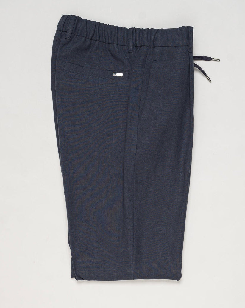 Main fabric: 70% Linen 30% Cotton
Lining: 100% Cotton
Elastic with drawstring waist
Zip and button fastening
Slanted pockets
Welted back pockets
Matching &nbsp;jacket available. Jacket and trousers sold separately.
Article: PT000185U 17147
Color: 9200 / Navy Herno Linen & Cotton Trousers / Navy