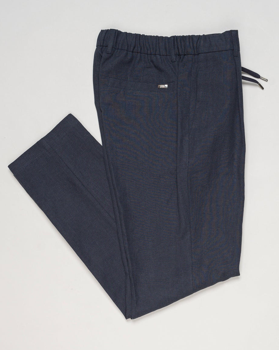 Main fabric: 70% Linen 30% Cotton
Lining: 100% Cotton
Elastic with drawstring waist
Zip and button fastening
Slanted pockets
Welted back pockets
Matching &nbsp;jacket available. Jacket and trousers sold separately.
Article: PT000185U 17147
Color: 9200 / Navy Herno Linen & Cotton Trousers / Navy