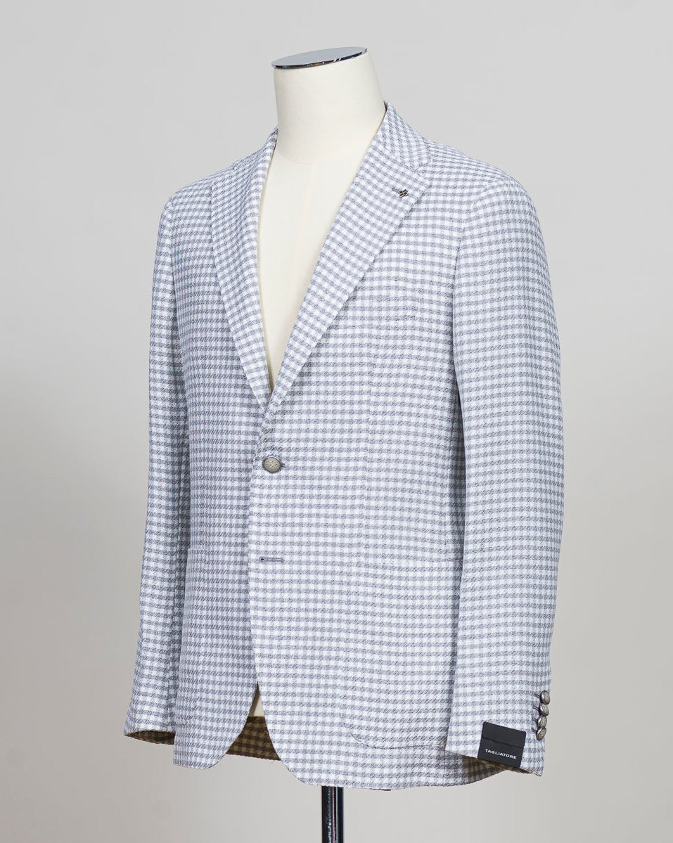 Single breasted
Notch lapels
Welted chest pocket
Patch side pockets
Unconstructed shoulder
Unlined
4 sleeve buttons
Model: 1SHO22KK--
Art. 610082 Q
Col P1180
74% cotton, 25% virgin wool, 1% elastane
Made in Italy Tagliatore Houndstooth Jacket / Off White & Grey