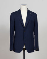 Single breasted
2 buttons
Notch lapels
Welted chest pocket
Patch side pockets
Unconstructed shoulder
Unlined
4 sleeve buttons
Model: 1SHO22KK
Art. 210025S
Col B3202
46% virgin wool, 26% viscose, 26% cotton, 2% elastane&nbsp;
Made in Italy Tagliatore Herringbone Jacket / Navy