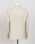 Modello: Sorrento
Unconstructed
Half lined
Composition: 100% Virgin Wool
Article: G55943'
Col. Light Beige 
Made in Napoli, Italy
Luigi Borrelli Windowpane Jacket / Light Beige