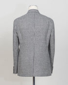New York 1SNY10B 
Double-breasted
Peak lapel
One vent / centerback
2 Patch pockets
100% wool
Art 630017
Col N1308 / Black & white
Made in Martina Franca, Italy Tagliatore Double-Breasted Houndstooth Jacket / Black & White