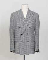 New York 1SNY10B&nbsp;
Double-breasted
Peak lapel
One vent / centerback
2 Patch pockets
100% wool
Art 630017
Col N1308 / Black &amp; white
Made in Martina Franca, Italy Tagliatore Double-Breasted Houndstooth Jacket / Black &amp; White