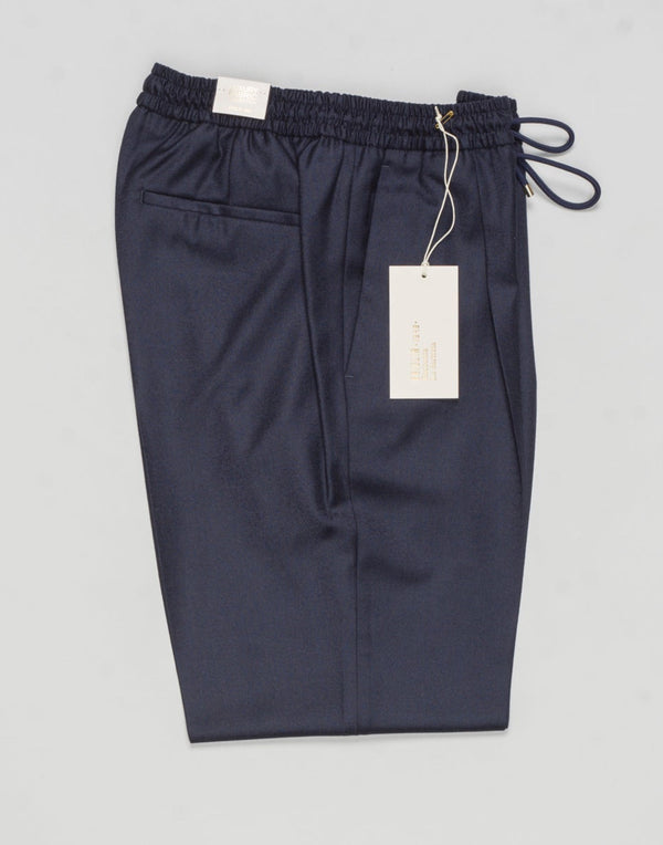 Article: 400123
Model: Wimbledons
Color: Navy / 11
Composition: 90% Virgin Wool 10% Cashmere
Lining: 100% Cotton
One Pleat
Slanted side pockets
Drawstring waist
Made in Naples, Italy Briglia Drawstring Flannel Trousers / Navy