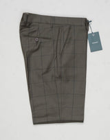 Model: Sauma20
Flat front
Front pockets: slanted
Back pockets: with button
Belt loops
3,5cm turn ups
Article: an1248
Color: Dark Green
Composition: 100% virgin wool natural stretch
Made in Martina Franca, Italy Berwich Windowpane Wool Trousers / Dark Green