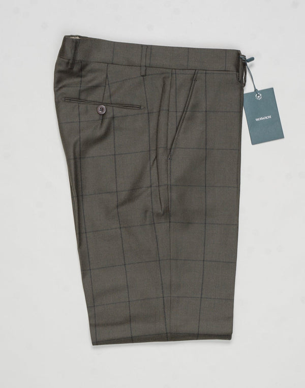 Model: Sauma20
Flat front
Front pockets: slanted
Back pockets: with button
Belt loops
3,5cm turn ups
Article: an1248
Color: Dark Green
Composition: 100% virgin wool natural stretch
Made in Martina Franca, Italy Berwich Windowpane Wool Trousers / Dark Green