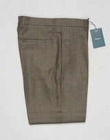 Model: Chiaia long
Single pleat
Front pockets: seam
Back pockets: welted
Hemming: 5cm turn ups
Article: ca2034
Color: Army
Composition: 100% Virgin wool natural stretch
Made in Martina Franca, Italy Berwich Puppytooth Trousers / Army