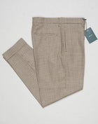 Model: Chiaia long
Single pleat
Front pockets: seam
Back pockets: welted
Hemming: 5cm turn ups
Article: ca2034
Color: Brown
Composition: 100% Virgin wool natural stretch
Made in Martina Franca, Italy Berwich Puppytooth Trousers / Beige
