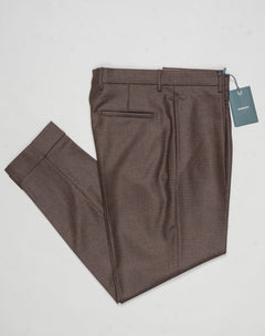 Model: Chiaia long
Single pleat
Front pockets: seam
Back pockets: welted
Hemming: 5cm turn ups
Article: ca2034
Color: Brown
Composition: 100% Virgin wool natural stretch
Made in Martina Franca, Italy Berwich Puppytooth Trousers / Brown