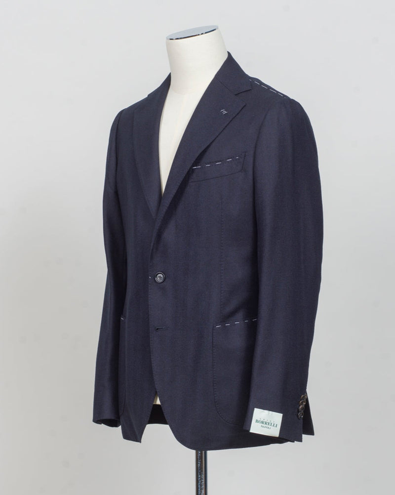 Modello: Sorrento
Hand finished&nbsp;
Unconstructed&nbsp;
Half lined
Composition: 100% Virgin Wool Flannel
Tone on tone herringbone&nbsp;
Article: G20953
Col 1022 / Navy
Made in Napoli, Italy