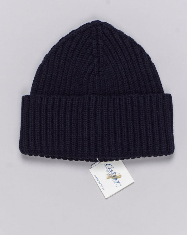 Composition: 100% Extrafine Merino Wool
Article: W23200
Color: Navy / 10215
Made in Italy Calimar Ribbed Merino Beanie / Navy