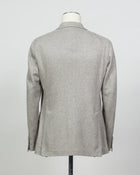 Composition: 100% Cashmere
Lining: 100% Cupro
Modello: Monte Carlo / 1SHJ22K
Color: Taupe / T1003
Unconstructed shoulder
Unlined
2 Buttons
Notch lapel
Patch pockets
Side vents
Made in Martina Franca, Italy Tagliatore Cashmere Jersey Jacket / Light Taupe