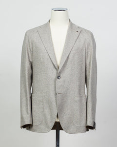 Composition: 100% Cashmere
Lining: 100% Cupro
Modello: Monte Carlo / 1SHJ22K
Color: Taupe / T1003
Unconstructed shoulder
Unlined
2 Buttons
Notch lapel
Patch pockets
Side vents
Made in Martina Franca, Italy Tagliatore Cashmere Jersey Jacket / Light Taupe