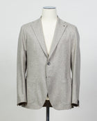Composition: 100% Cashmere
Lining: 100% Cupro
Modello: Monte Carlo / 1SHJ22K
Color: Taupe / T1003
Unconstructed shoulder
Unlined
2 Buttons
Notch lapel
Patch pockets
Side vents
Made in Martina Franca, Italy Tagliatore Cashmere Jersey Jacket / Light Taupe