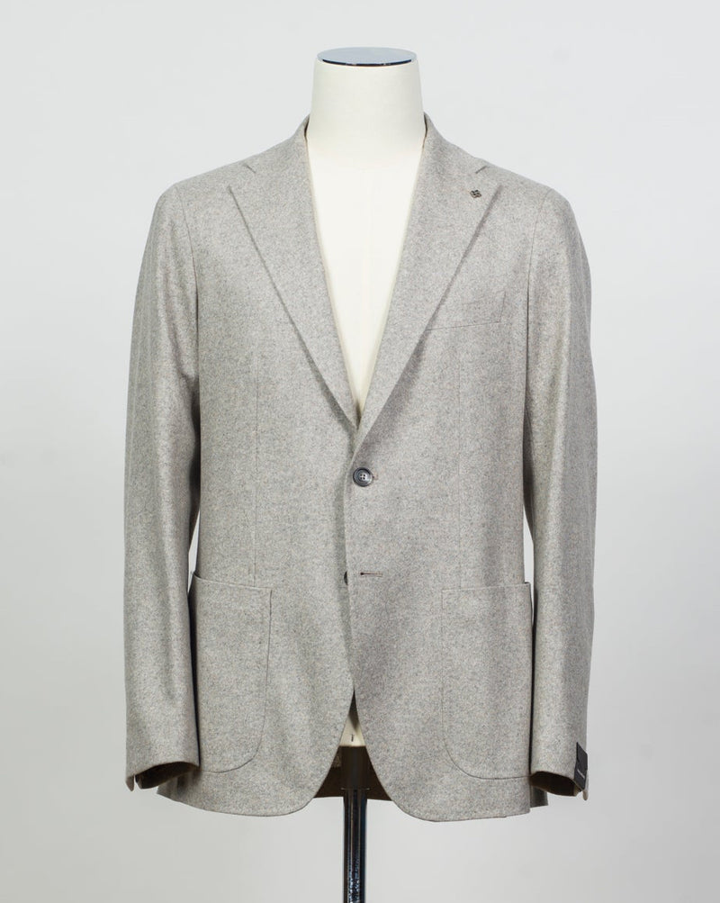 Composition: 100% Cashmere
Lining: 100% Cupro
Modello: Monte Carlo / 1SHJ22K
Color: Taupe / T1003
Unconstructed shoulder
Unlined
2 Buttons
Notch lapel
Patch pockets
Side vents
Made in Martina Franca, Italy Tagliatore Cashmere Jersey Jacket / Light Taupe