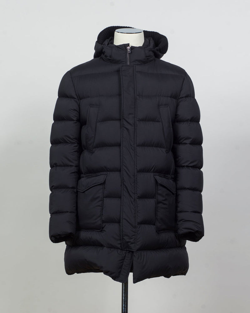 Article: PI003ULE-M02 12456Z 9300
Color: Black
Main fabric:&nbsp;100% nylon
Coating: polyurethane
Main Lining: 100% nylon
Trimming: 100% wool
Padding: 90% goose down, 10% goose feather
Hood Padding: 100% polyester
Side pockets with flap and snap button fastening
Chest pockets with snap button fastening
Hood with removable trimming
Regular fit Herno Down Parka / Black