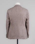 Caruso blazer impeccably tailored in Soragna, Parma, Italy.
Stunning lightness and ease of movement without losing the classic tailored elegance. These are some of the ingredients that make Italian tailoring world famous and you can find it all in Caruso garments. 

Beautiful handmade detailing and naturally with a full canvas structure inside.

Full canvas
Fully lined 
Unconstructed shoulder
Model: Aida
Composition: 90% Wool, 5% Silk, 3% Linen, 2% Cashmere
Color: 0570 / Light Brown Caru