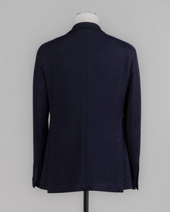 Composition: 40% Polyester 30% Virgin Wool 30% Acrylic
Modello: Monte Carlo / 1SMJ22K
Color: Navy / B3343
Unconstructed shoulder
Unlined
2 Buttons
Notch lapel
Patch pockets
Side vents
Made in Martina Franca, Italy Tagliatore Jersey Knit Jacket / Navy