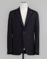 Composition: 40% Polyester 30% Virgin Wool 30% Acrylic
Modello: Monte Carlo / 1SMJ22K
Color: Black / N3342
Unconstructed shoulder
Unlined
2 Buttons
Notch lapel
Patch pockets
Side vents
Made in Martina Franca, Italy Tagliatore Jersey Knit Jacket / Black