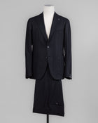 Composition: 99% Virgin wool Super 100's 1% Elastane
Modello: Monte Carlo / 2SMC22K01
Color: Black / N1124
Unconstructed shoulder
Unlined
2 Buttons
Notch lapel
Patch pockets
Side vents
Belt loops
Flat front
Made in Martina Franca, Italy Tagliatore Flannel Suit / Black
