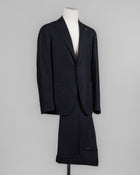 Composition: 99% Virgin wool Super 100's 1% Elastane
Modello: Monte Carlo / 2SMC22K01
Color: Black / N1124
Unconstructed shoulder
Unlined
2 Buttons
Notch lapel
Patch pockets
Side vents
Belt loops
Flat front
Made in Martina Franca, Italy Tagliatore Flannel Suit / Black