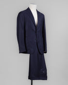 Composition: 100% Virgin wool Super 110's
Modello: Monte Carlo / 2SMC22K01
Color: Navy / B1263
Unconstructed shoulder
Unlined
2 Buttons
Notch lapel
Patch pockets
Side vents
Belt loops
Flat front
Made in Martina Franca, Italy Tagliatore Chalkstripe Flannel Suit / Navy