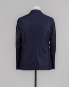 Composition: 100% Virgin wool Super 110's
Modello: Monte Carlo / 2SMC22K01
Color: Navy / B1263
Unconstructed shoulder
Unlined
2 Buttons
Notch lapel
Patch pockets
Side vents
Belt loops
Flat front
Made in Martina Franca, Italy Tagliatore Chalkstripe Flannel Suit / Navy