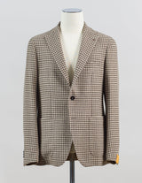 Modello: Monte Carlo / 1SMC22K
Color: Light Brown / EM836
Unconstructed shoulder
Unlined
2 Buttons
Notch lapel
Patch pockets
Side vents
Made in Martina Franca, Italy Tagliatore Houndstooth Jersey Jacket / Light Brown