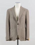 Modello: Monte Carlo / 1SMC22K
Color: Light Brown / EM836
Unconstructed shoulder
Unlined
2 Buttons
Notch lapel
Patch pockets
Side vents
Made in Martina Franca, Italy Tagliatore Houndstooth Jersey Jacket / Light Brown