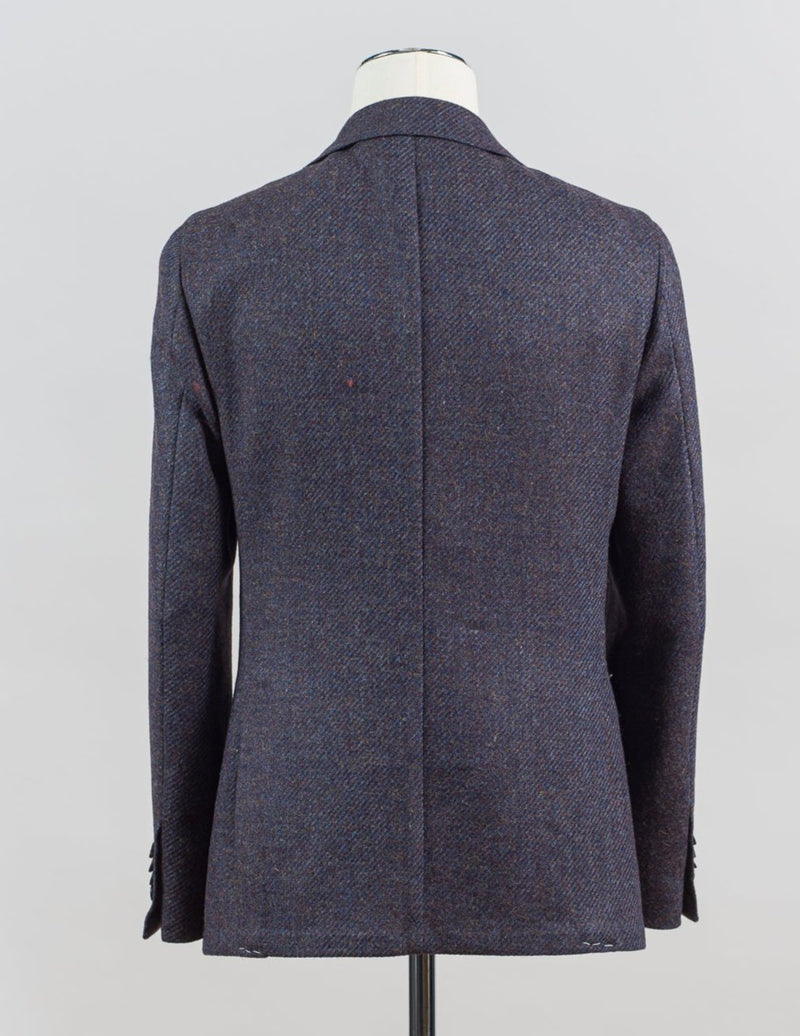 Patch pockets
Half lined
Unconstructed shoulder
Model: GJ02
Article: TW22114F
Color: 3390 / Blueberry/Brown
Composition: 100% Virgin Wool
Made in Italy Gaiola Tweed Jacket / Blueberry
