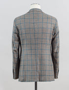 Composition: 88% Wool 12% Silk
2 buttons
side vents
notch lapel
fully lined Sauma Wool & Silk Glencheck Jacket / Brown