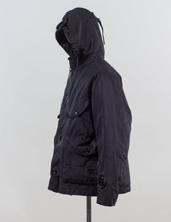 External fabric: 66% Polyester 34% Polyamide
Lens detail on left sleeve

Real Corozo buttons
Article: 17CMOW224A 110089G
Color: Black / 999
Detachable down layer
External Fabric: 100% Polyamide
Lining: 100% Polyamide
Filling: 90% Grey duck down 10% feather C.P Company Micro Kei La Mille Jacket / Black
