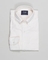 Cream&nbsp;Oxford shirt with button-down collar. Classic and very versatile shirt for casual dressed up days. You can wear it with a tie but it sure is at it's best without one.&nbsp; A stable for every mans wardrobe.&nbsp;

100% Cotton. Handcrafted in Somerset, UK.

Regular Fit
Button-down collar with soft feel
Box pleat
Single round one button cuff
Point pocket
Mother of Pearl buttons
100% cotton
Made in England&nbsp;