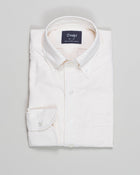 Cream Oxford shirt with button-down collar. Classic and very versatile shirt for casual dressed up days. You can wear it with a tie but it sure is at it's best without one.  A stable for every mans wardrobe. 

100% Cotton. Handcrafted in Somerset, UK.

Regular Fit
Button-down collar with soft feel
Box pleat
Single round one button cuff
Point pocket
Mother of Pearl buttons
100% cotton
Made in England 