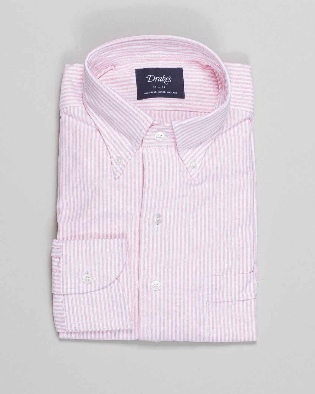 The oxford cloth button-down shirt is an enduring icon of menswear, which looks as good now as it did a century ago. It's an item that's at the very heart of our brand, and this is our attempt at perfecting the style. With a regular silhouette, floating interlinings, single-needle construction, and - perhaps most importantly - an elegant rolling collar, it's a shirt for all occasions.

100% Cotton
Made in Somerset, England
Button-Down Collar with Brushed, Floating Interlining
Box Pleat
Single Rounded One-Bu