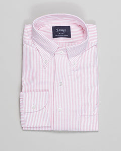 The oxford cloth button-down shirt is an enduring icon of menswear, which looks as good now as it did a century ago. It's an item that's at the very heart of our brand, and this is our attempt at perfecting the style. With a regular silhouette, floating interlinings, single-needle construction, and - perhaps most importantly - an elegant rolling collar, it's a shirt for all occasions.

100% Cotton
Made in Somerset, England
Button-Down Collar with Brushed, Floating Interlining
Box Pleat
Single Rounded One-Bu