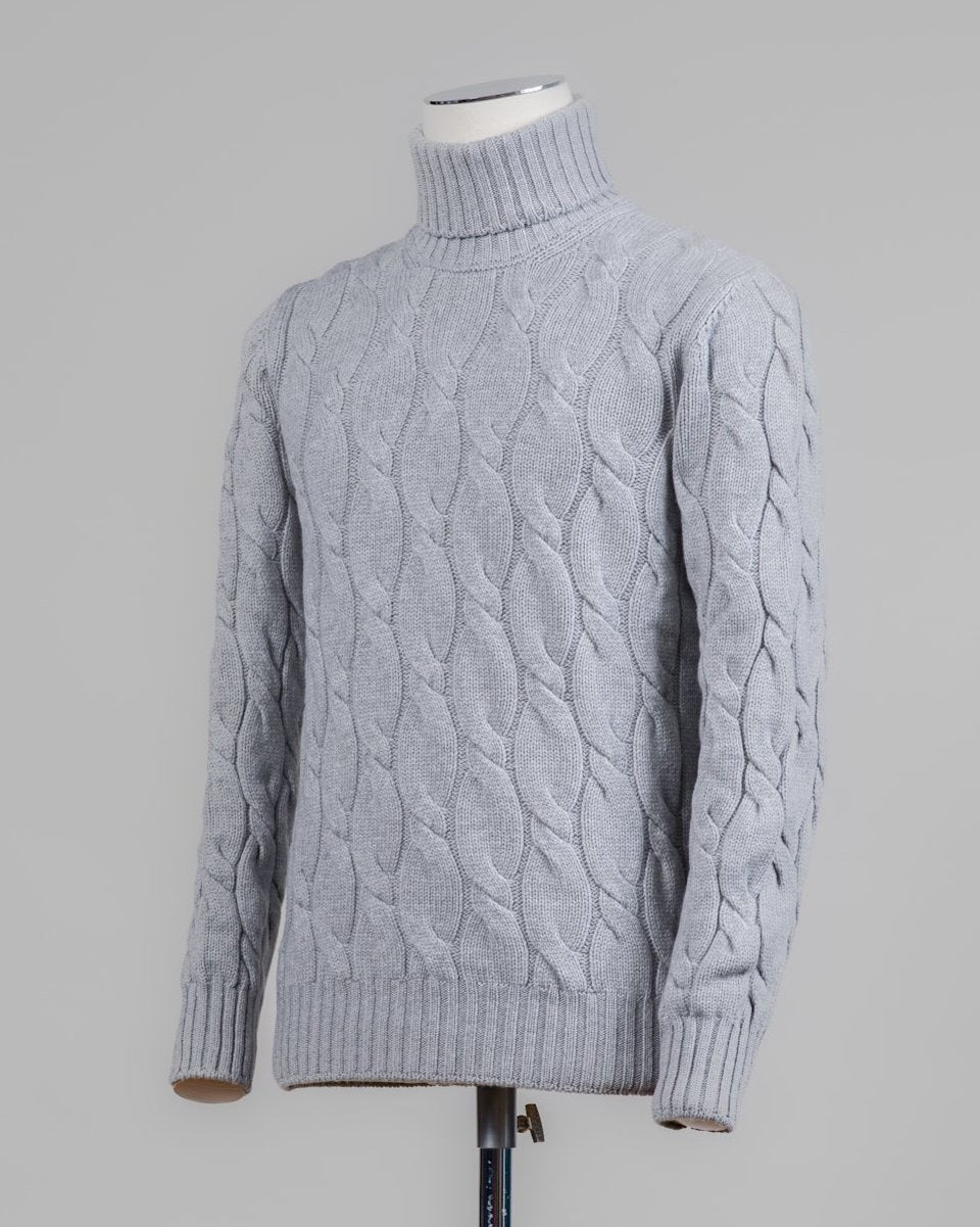 Classic version of a heavy roll neck with a beautiful knitted cable pattern. Warm and comfortable for the cold season.

Article: 13115/19659
Color: 061 / Light Grey
Composition: 80% Virgin Wool 10% Cashmere 10% Viscose

Made in Italy Gran Sasso Cable Knit Roll Neck / Light Grey
Article: 13115/19659
Color: 061 / Light Grey
Composition: 80% Virgin Wool 10% Cashmere 10% Viscose

Made in Italy Gran Sasso Cable Knit Roll Neck / Light Grey