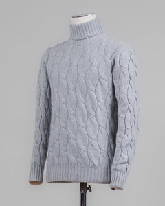 Classic version of a heavy roll neck with a beautiful knitted cable pattern. Warm and comfortable for the cold season.

Article: 13115/19659
Color: 061 / Light Grey
Composition: 80% Virgin Wool 10% Cashmere 10% Viscose

Made in Italy Gran Sasso Cable Knit Roll Neck / Light Grey
Article: 13115/19659
Color: 061 / Light Grey
Composition: 80% Virgin Wool 10% Cashmere 10% Viscose

Made in Italy Gran Sasso Cable Knit Roll Neck / Light Grey