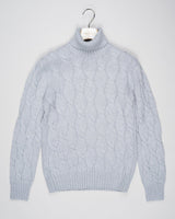 Classic version of a heavy roll neck with a beautiful knitted cable pattern. Warm and comfortable for the cold season.

Article: 13115/19659
Color: 061 / Light Grey
Composition: 80% Virgin Wool 10% Cashmere 10% Viscose

Made in Italy Gran Sasso Cable Knit Roll Neck / Light Grey