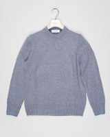 Crew neck knit with a up-to-date, two toned&nbsp; melangé pattern. Fibers of geelong lambswool are extra crimped and curly. This makes it extremely soft, warm and comfortable to wear.

Article: 10158/25701
Color: 818 / Blue &amp; Grey
Composition: 100% Virgin Wool (Super Geelong)

Made in Italy Gran Sasso Two-tone Wool Crew Neck / Blue