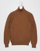 Gran Sasso Structured Merino Roll Neck / Brown Article: 57157/14280
Color: 187 / Brown
Composition: 100% Virgin Wool
Extrafine Merino
Made in Italy 
