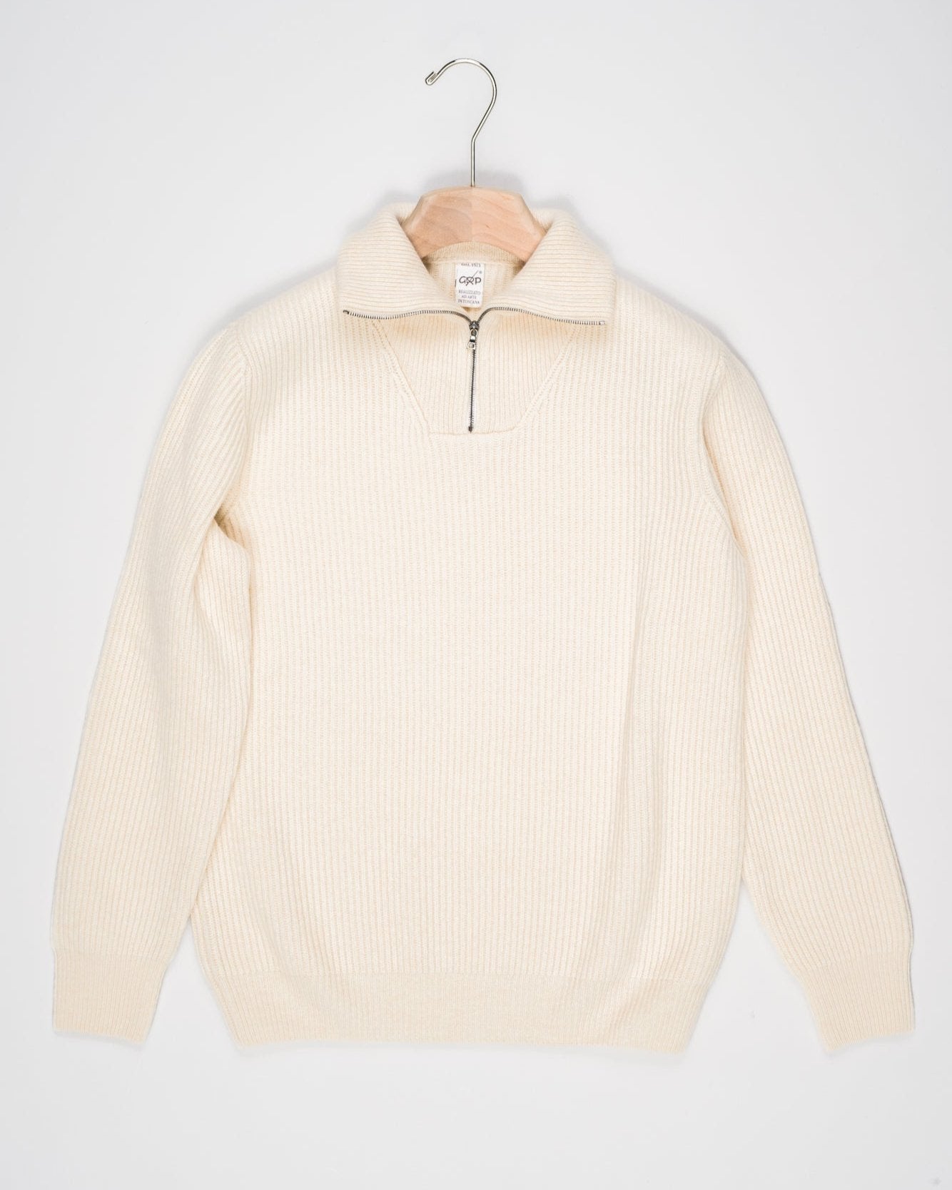 G.R.P. Firenze Ribbed Half-Zip Knit / Ecru Model: Anorak
Article: 7.CI10
Color: Ecru
90% Wool 10% Cashmere
Made in Florence, Italy G.R.P. Firenze Ribbed Half-Zip Knit / Ecru