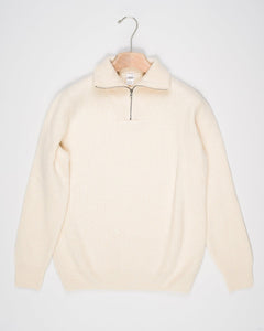 G.R.P. Firenze Ribbed Half-Zip Knit / Ecru Model: Anorak
Article: 7.CI10
Color: Ecru
90% Wool 10% Cashmere
Made in Florence, Italy G.R.P. Firenze Ribbed Half-Zip Knit / Ecru