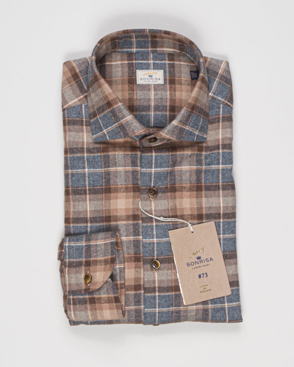 Sonrisa Silvery Line
Soft collar with removable collar bones&nbsp; / Collar 438&nbsp;
Long sleeves
Composition: 100% Cotton
Article: E4127
Color: 01 / Brown & Grey
Made in Italy Sonrisa Flannel Check Shirt / Brown & Grey