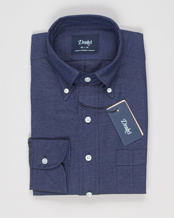 Navy cotton flannel shirt with button-down collar.&nbsp;

100% Cotton. Handcrafted in Somerset, UK.

Regular Fit
Button-down collar with soft feel
Box pleat
Single round one button cuff
Chest pocket

100% cotton
Made in England Drake's Cotton Flannel Button-Down Shirt / Navy
