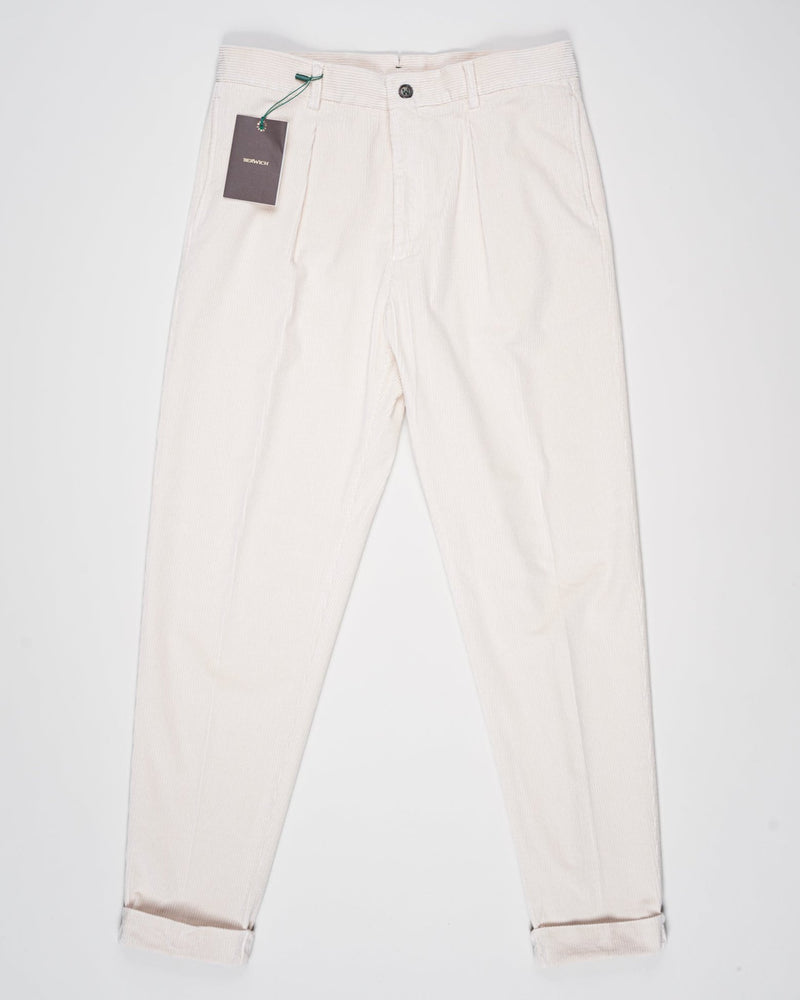 Model: Chiaia long

Single pleat
Front pockets: seam
Back pockets: welted
Hemming: 5cm turn ups
Article: dv0500x
Color: Latte
Composition: 98% Cotton 2% Elastan
Made in Martina Franca, Italy Berwich Garment Dyed Corduroy Trousers / Latte