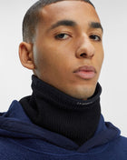 Ribbed 100% Merino wool neck warmer Adjustable neckline Logo detailing in front Art. 15CMAC304A 005509A Col 999 / Black C.P. Company Extra Fine Merino Wool Snood / Black'