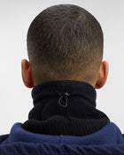 Ribbed 100% Merino wool neck warmer Adjustable neckline Logo detailing in front Art. 15CMAC304A 005509A Col 999 / Black C.P. Company Extra Fine Merino Wool Snood / Black